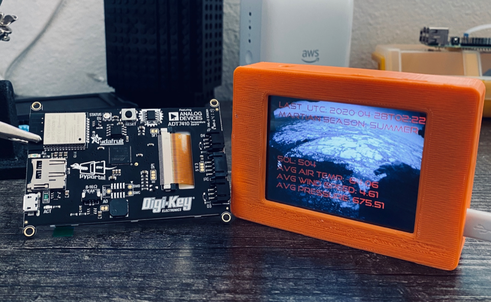 An Adafruit PyPortal displaying the latest images from the Mars Curiosity Rover and weather data from InSight Mars Lander.