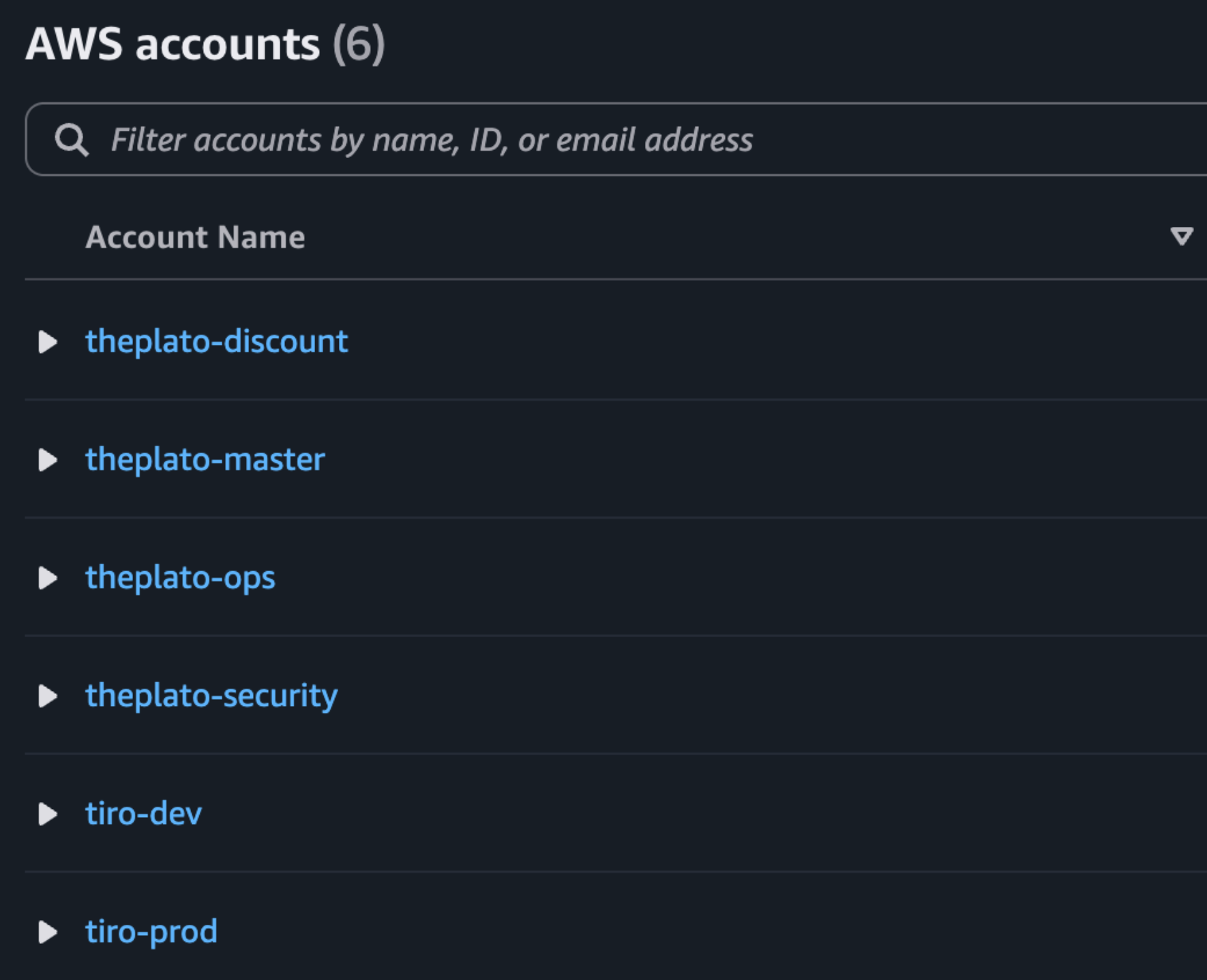 AWS IAM Identity Center의 계정 목록 화면. Management, Security, Ops, Development, Production 등 역할별로 분리된 6개 계정이 표시되어 있다.
