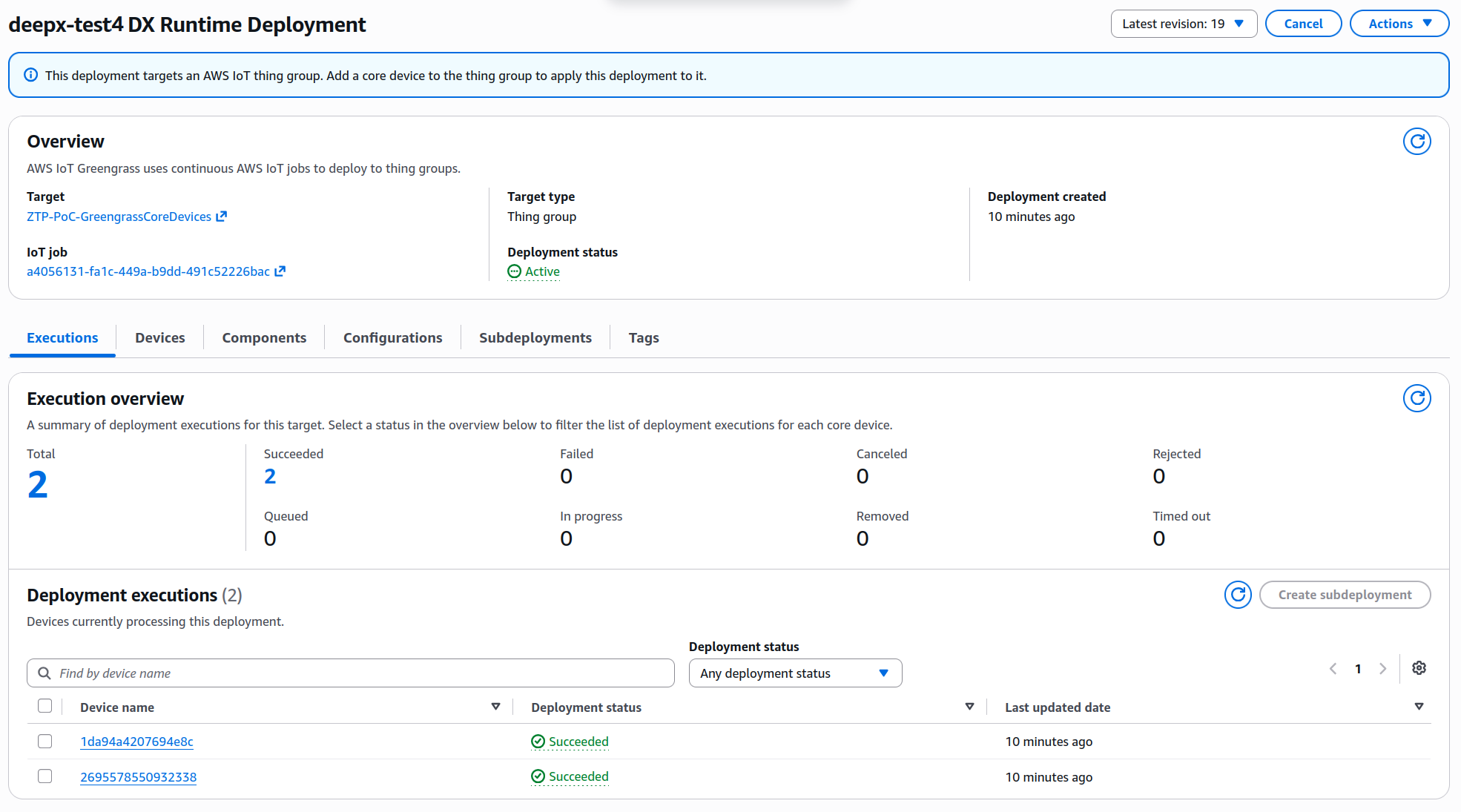 AWS IoT Greengrass 배포 상세 화면 스크린샷으로, deepx-test4 DX Runtime Deployment가 ZTP-PoC-GreengrassCoreDevices Thing Group을 대상으로 Active 상태이며, 총 2대 디바이스 실행 중 2대 모두 Succeeded로 배포가 완료되었음을 보여준다.
