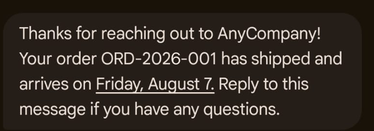RCS text message from the AnyCompany agent confirming that order ORD-2026-001 has shipped