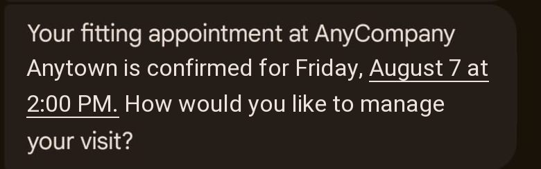 RCS text message confirming a fitting appointment at AnyCompany Anytown