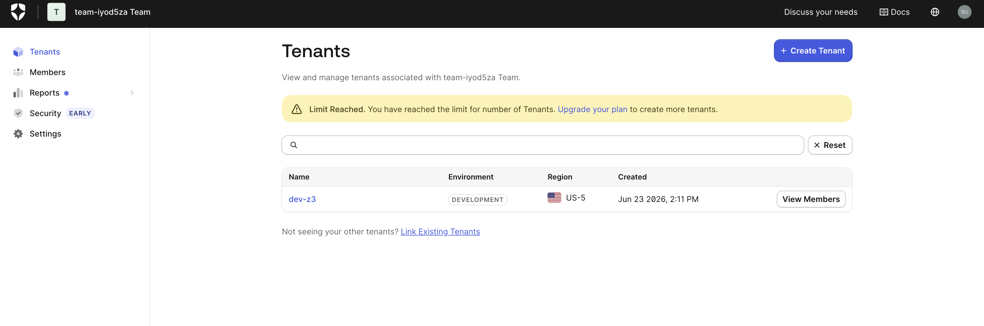 Screenshot of the Auth0 dashboard Tenants page listing a development tenant with its name, environment, region, and creation date visible in the tenant row.