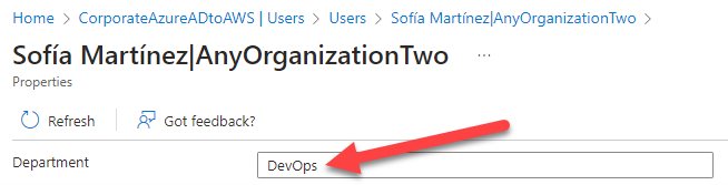 The Azure console displays the Department attribute of a user which we have populated with DevOps