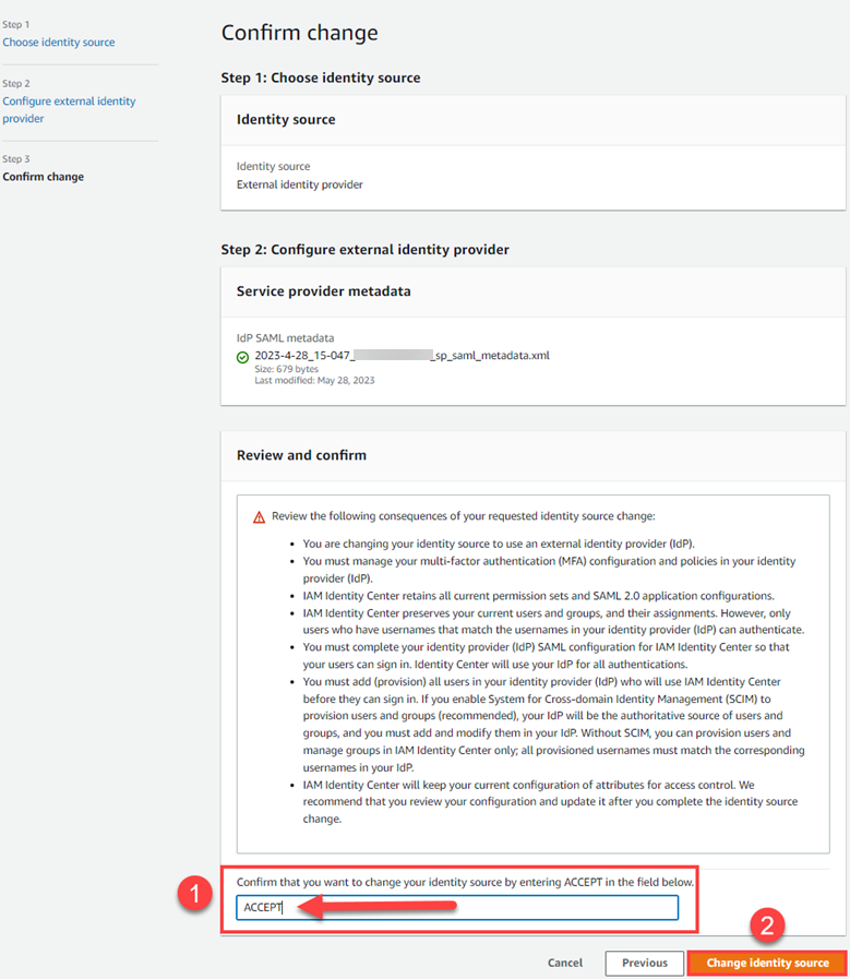 IAM Identity Center console displays the Confirm Change screen where we must type Accept to confirm that we will change the Identity source.