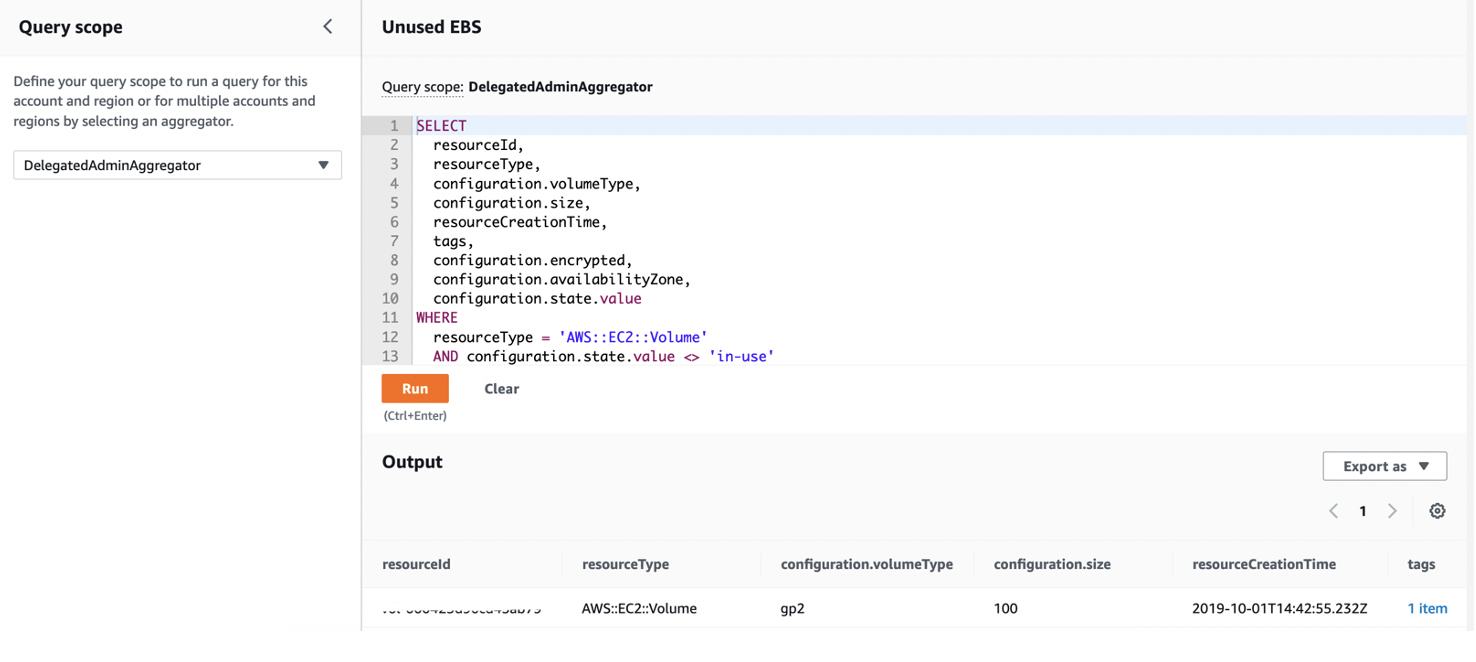 The Query scope is set to DelegatedAdminAggregator. The code window displays a sample query to list all EBS volumes that are not in use. 