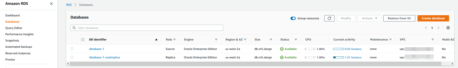 The Databases page displays a source database (database-1) and replica (database-1-readreplica).