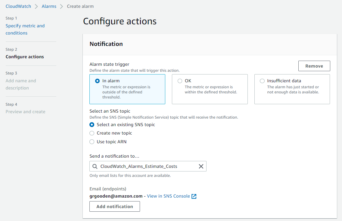 On the Configure actions page, select an SNS topic that will receive the notification when the alarm has been triggered, and then provide an email address. If you do not have an existing SNS topic, you must create an SNS Topic and return to this step. This email address should correspond to the classification level of the environment. 