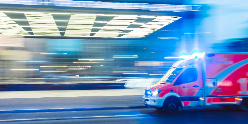 Ambulance in front of a hospital