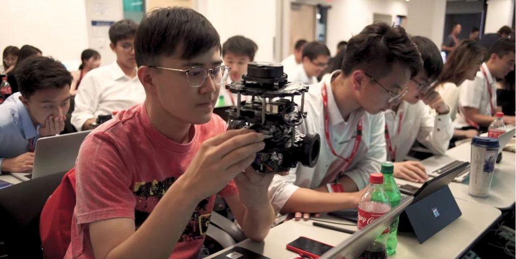 Students learning robotics