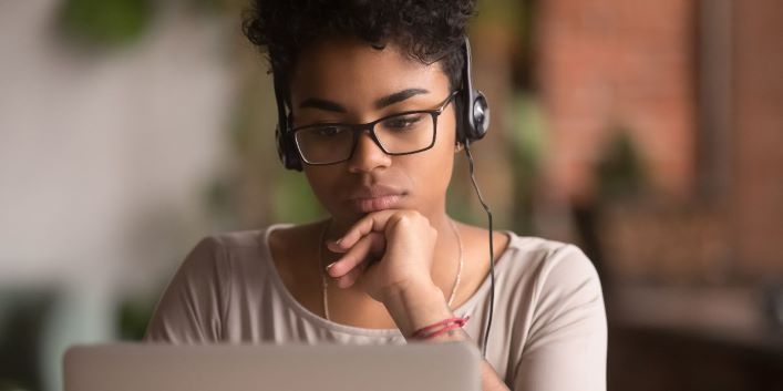 woman taking test on computer