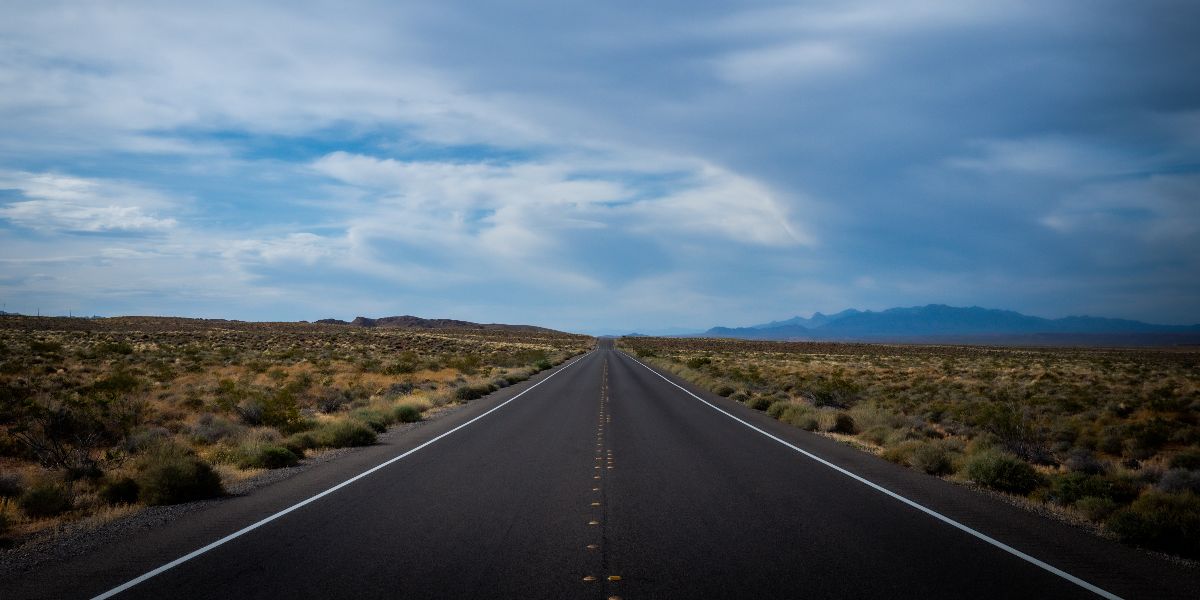 open road leading to horizon