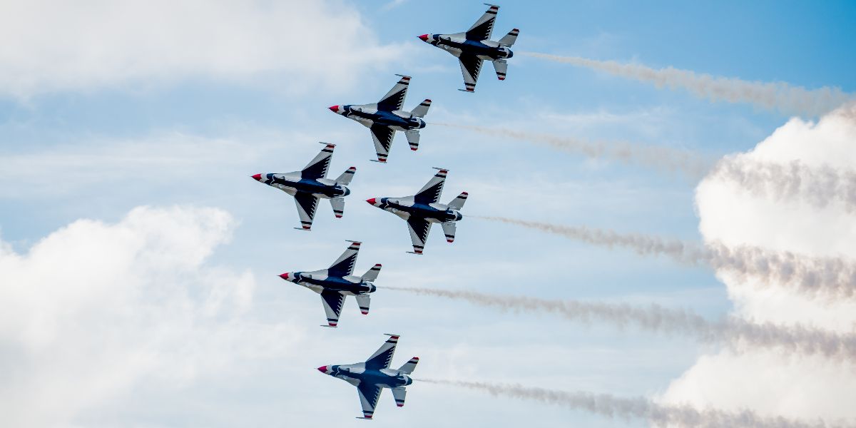 USAF F-16 Thunderbirds Flying Above the Clouds