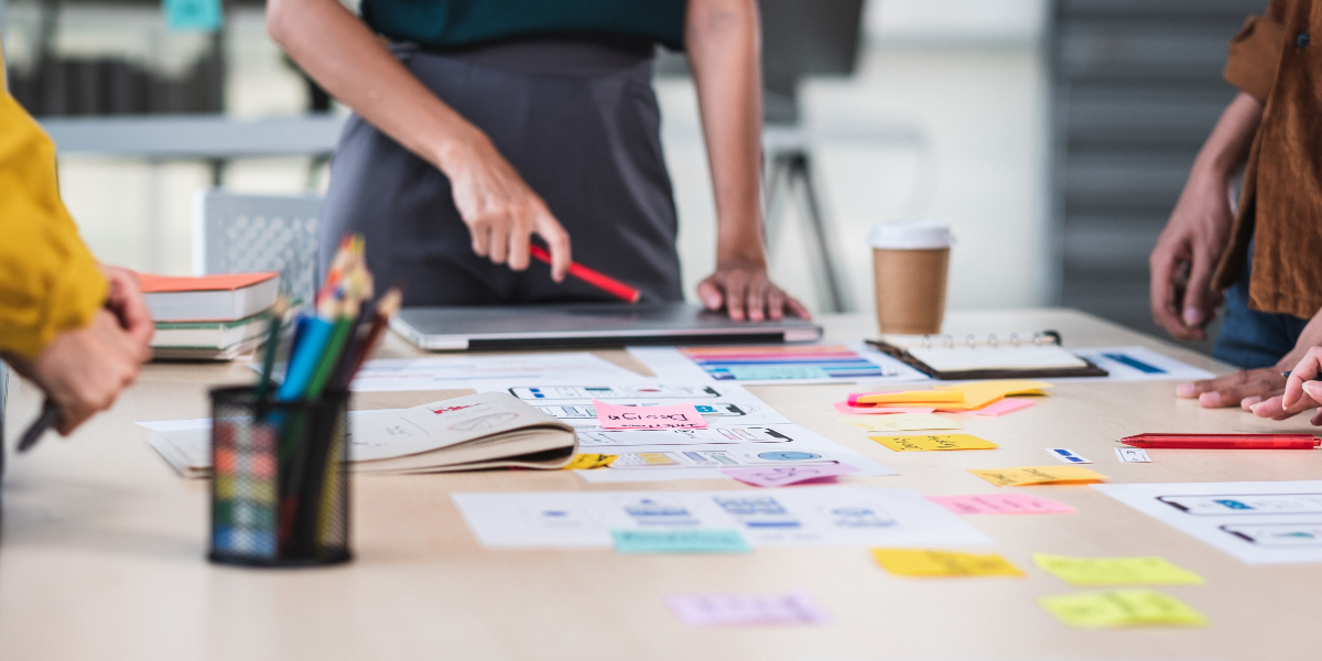 people collaborating over a desk