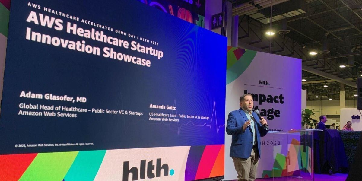 Pictured: Adam Glasofer, MD, global head of healthcare for public sector VC and startups at Amazon Web Services (AWS), announces the new AWS Healthcare Accelerator Global Cohort for Workforce Development at the HLTH 2022 event in Las Vegas, November 16, 2022.