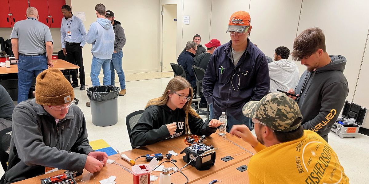 Pictured: Learners take part in hands-on learning at the AWS Fiber Optic Fusion Splicing Certificate Course between November 14-15 at Mountain Empire Community College.