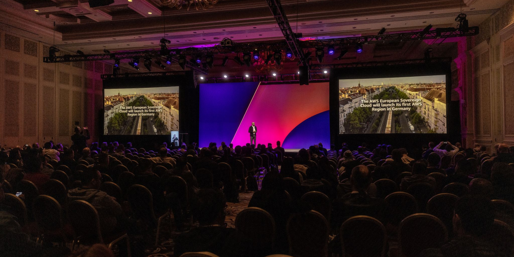 photo of Dave Levy on stage and speaking during his Innovation Talk