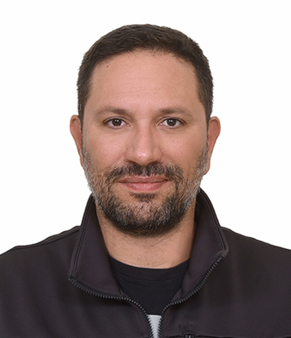 Dr. Yannis Zisos