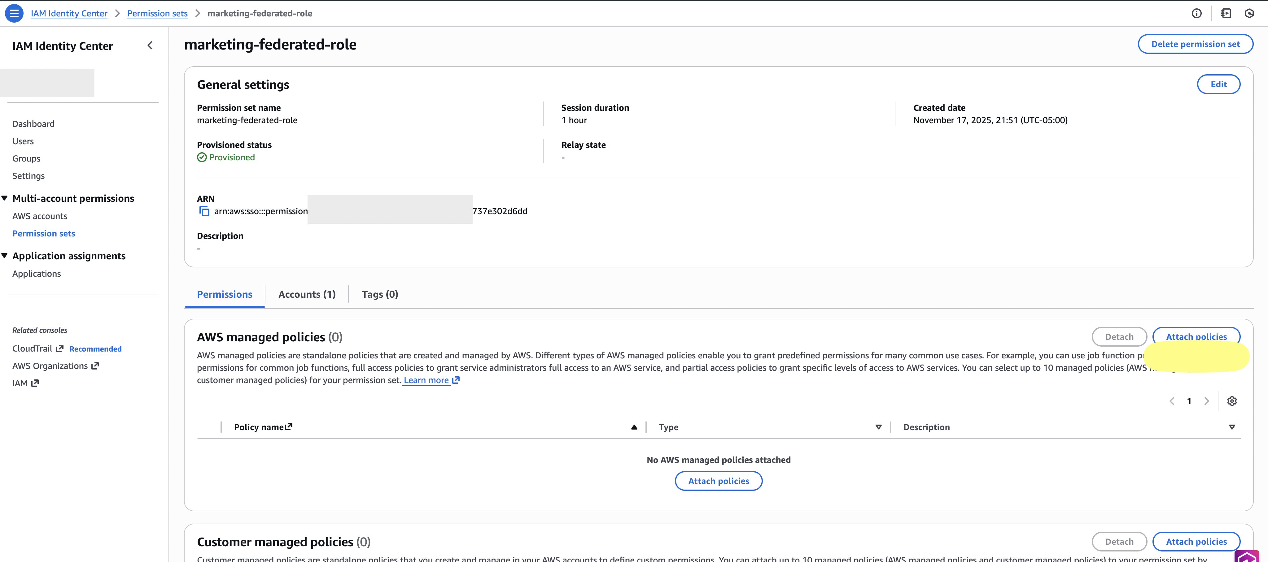 AWS IAM Identity Center console screenshot displaying the marketing-federated-role permission set configuration page with provisioned status, 1-hour session duration, and empty AWS managed and customer managed policy sections with attach policy options.