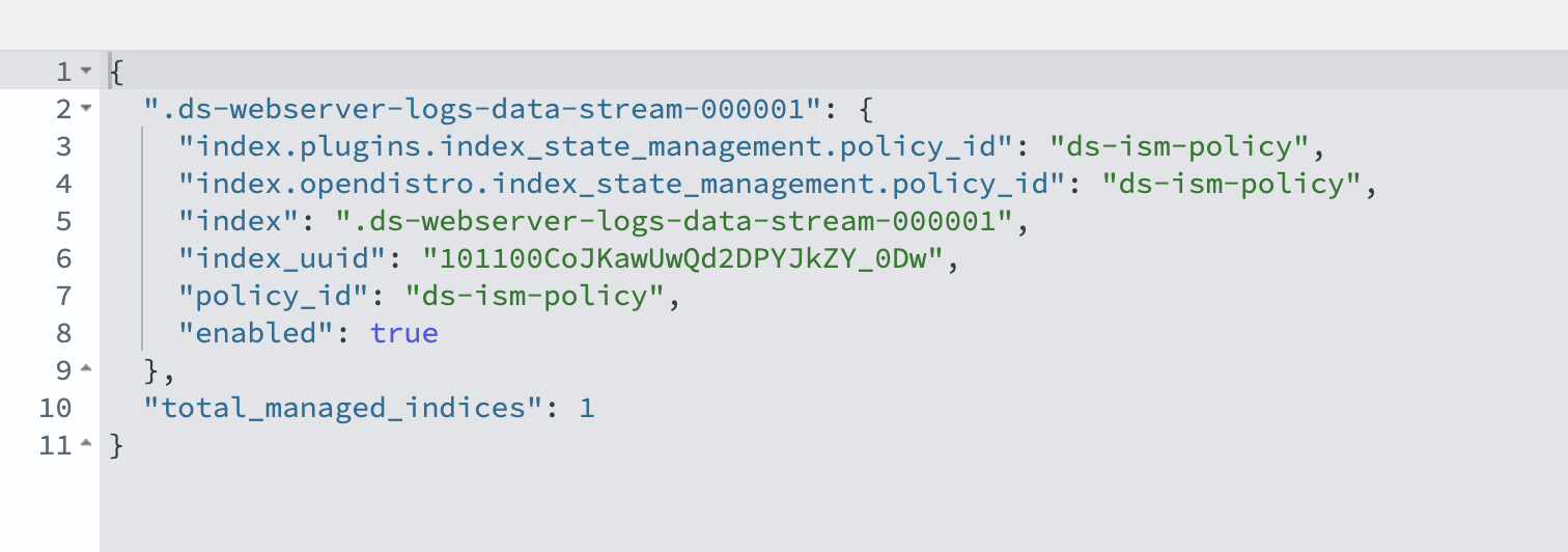 OpenSearch explain output showing the ISM policy_id mapped to the data stream with enabled set to true