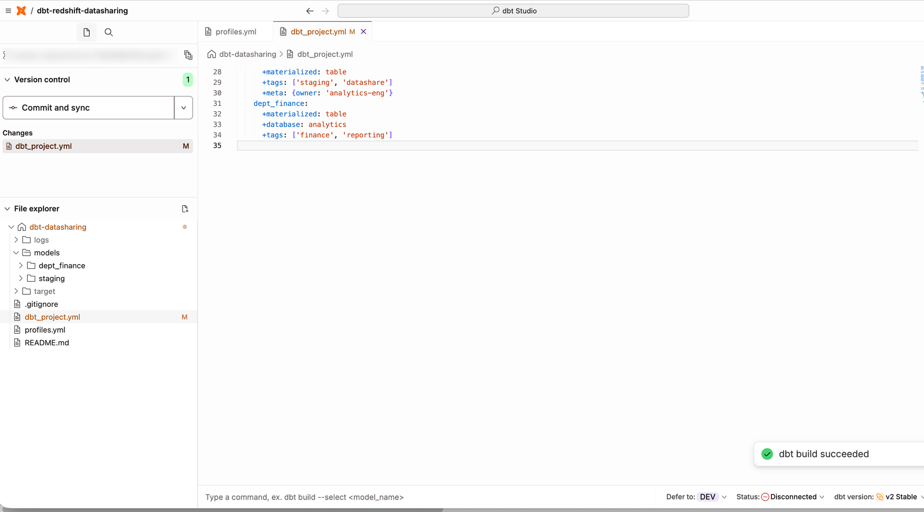 dbt Studio showing dbt_project.yml edits and a dbt build succeeded notification