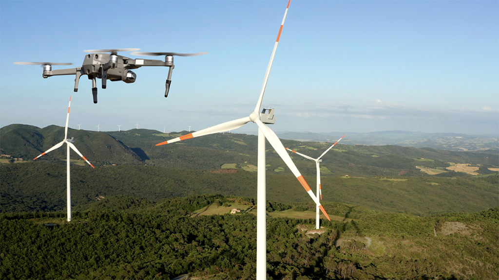 drone flying in front of the turbines