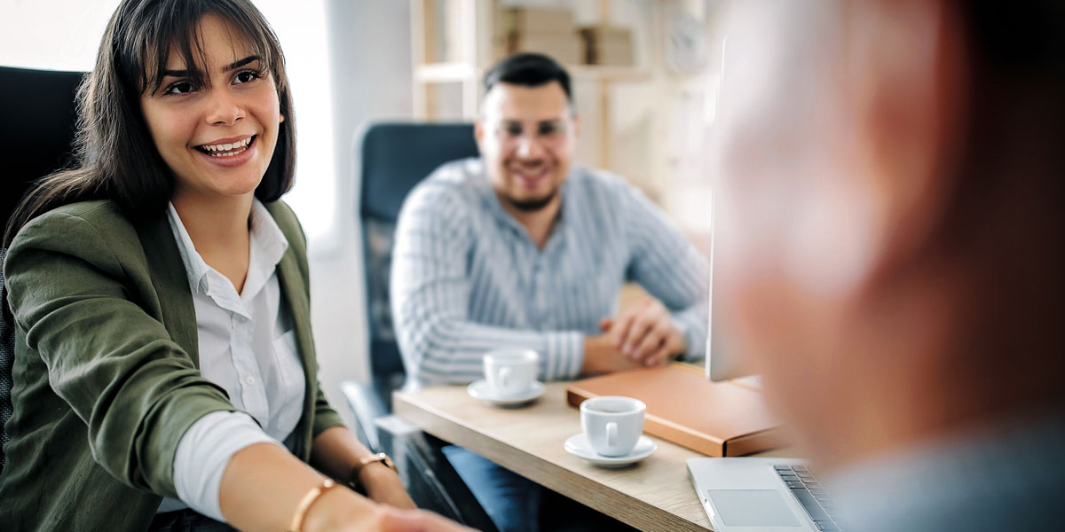 Account team and customer meeting in an office