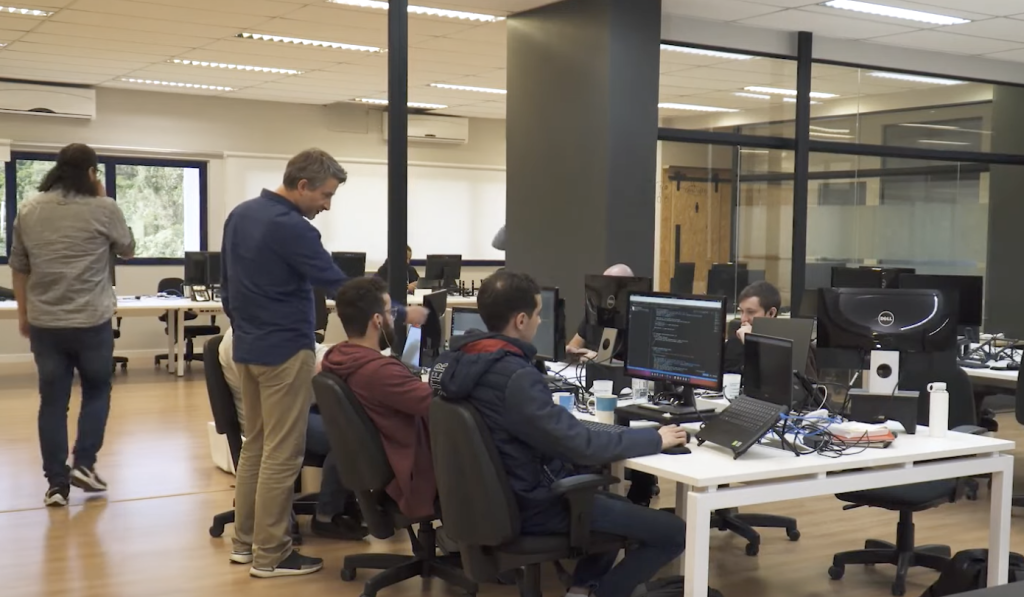 4Asset office with people working at a table