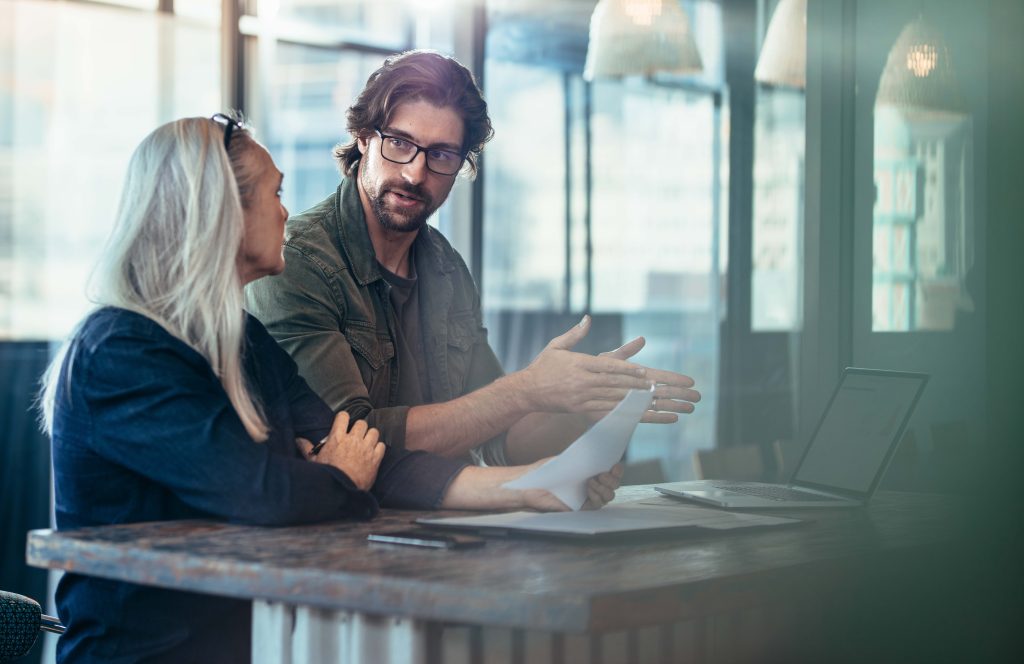 Two coworkers in discussion