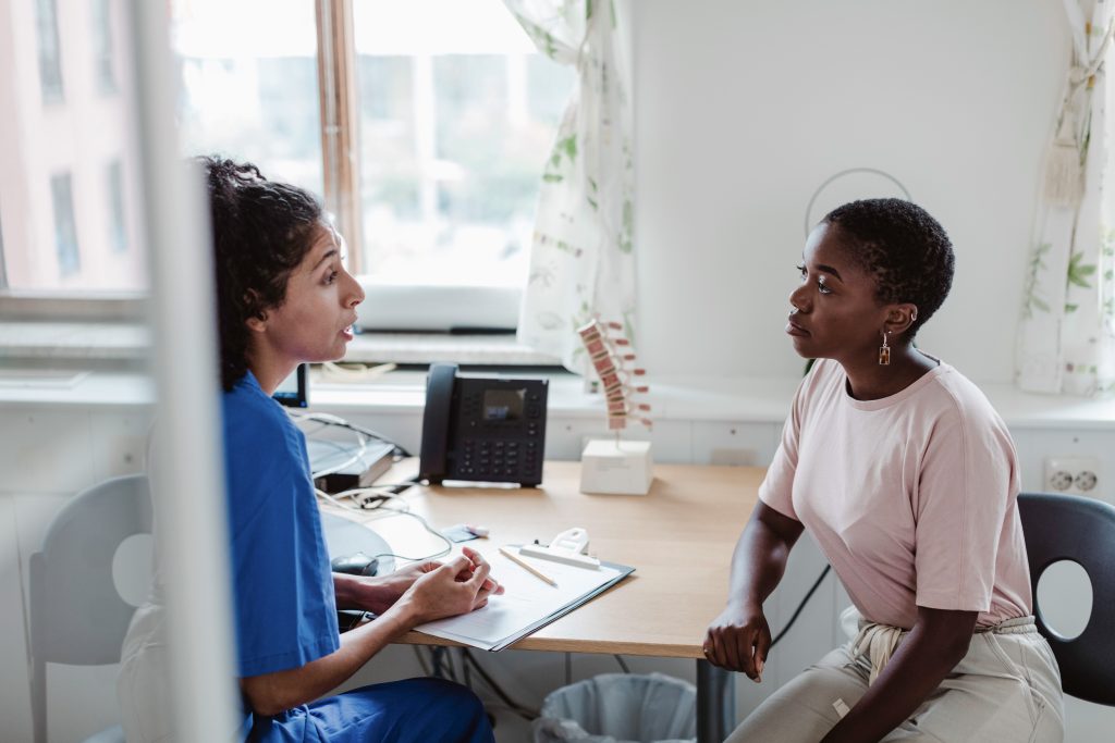 Doctor meeting with her patient