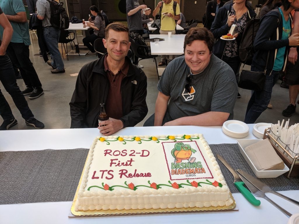 Brian Gerkey and William Woodall of Open Robotics – cake-cutting ceremony.