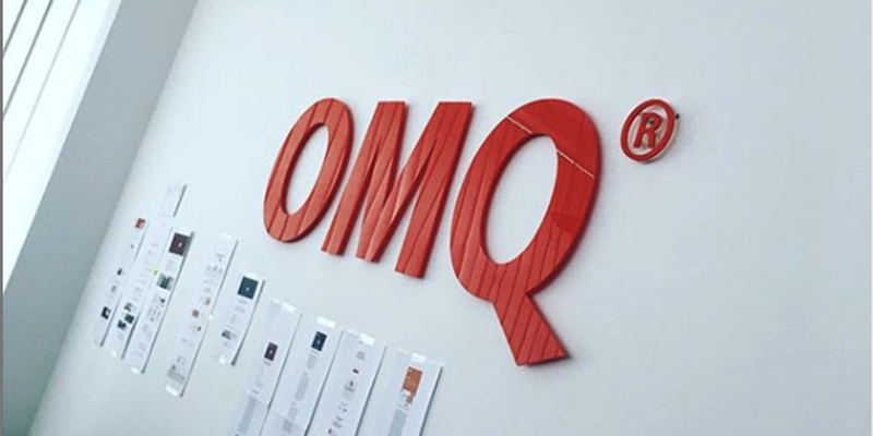 OMQ signage at their offices