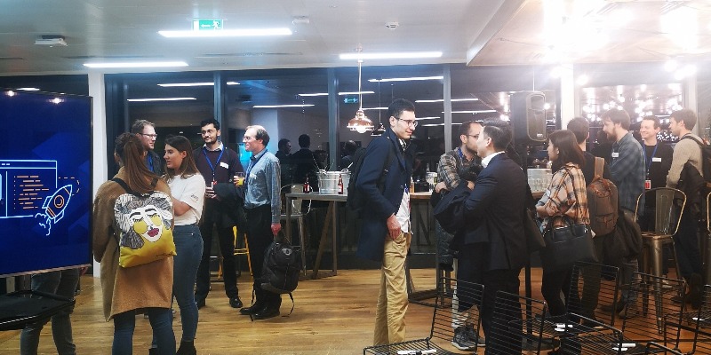 Startup Garage Event where entrepreneurs are mingling and having drinks