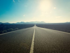 View of a long highway leading into the horizon