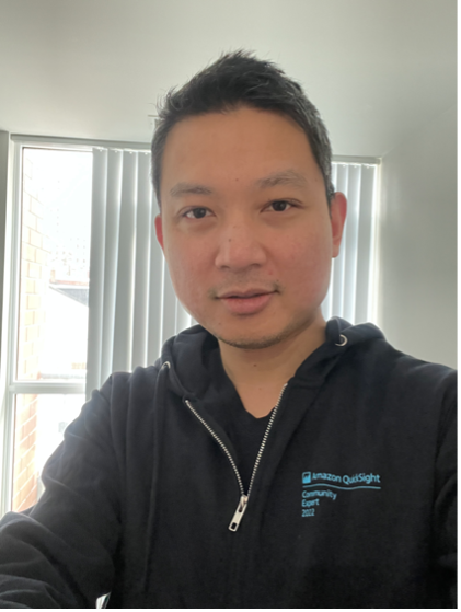 David Wong wears a QuickSight Expert hoodie