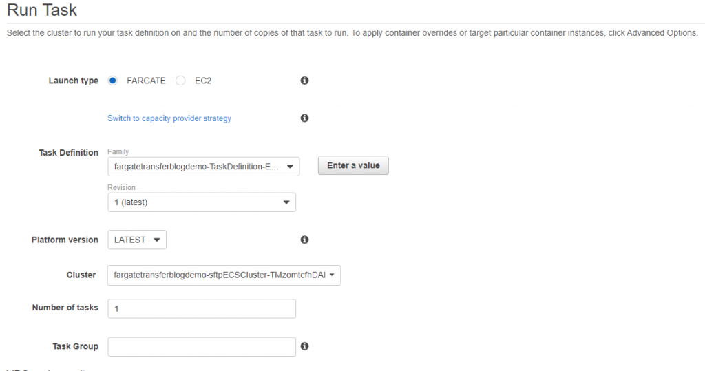 Select Fargate as the Launch type, and the Task Definition and Cluster created by CloudFormation.