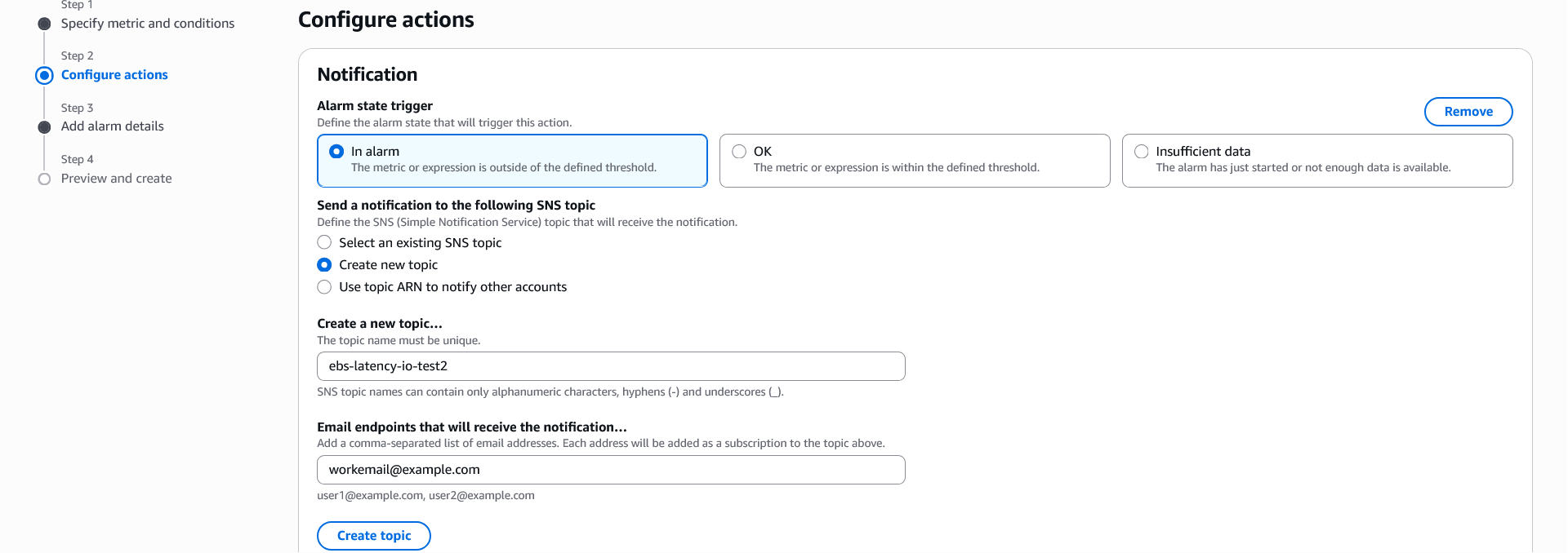 AWS CloudWatch interface showing the 'Configure actions' step of alarm creation. The screen displays options for setting up notifications when an alarm state is triggered, with 'Create new topic' selected for an SNS topic named 'ebs-latency-to-test2' and an email endpoint configured.