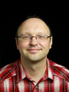 Portrait of Vadim Omeltchenko, author and AWS expert