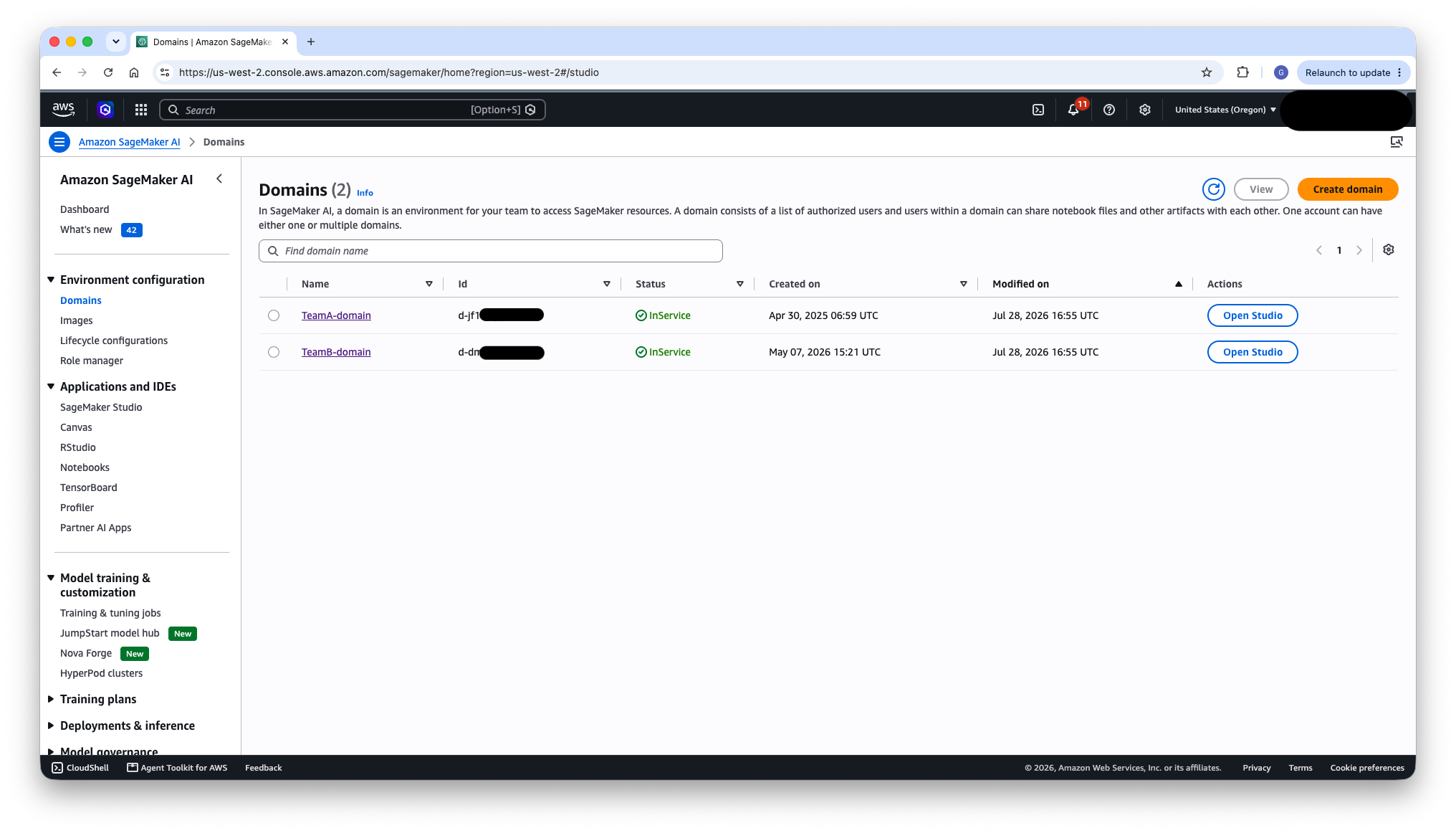 SageMaker console listing TeamA-domain and TeamB-domain