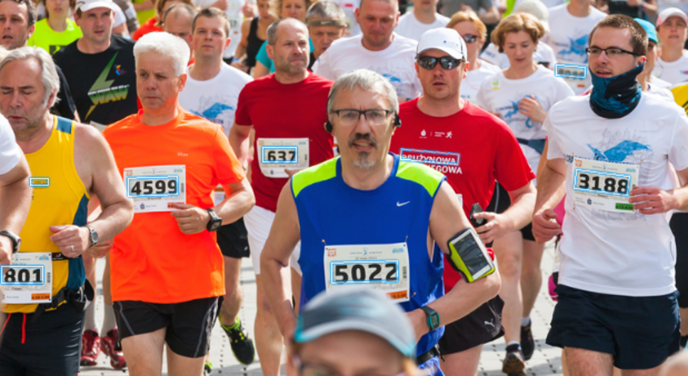 Runners in a race with jersey numbers