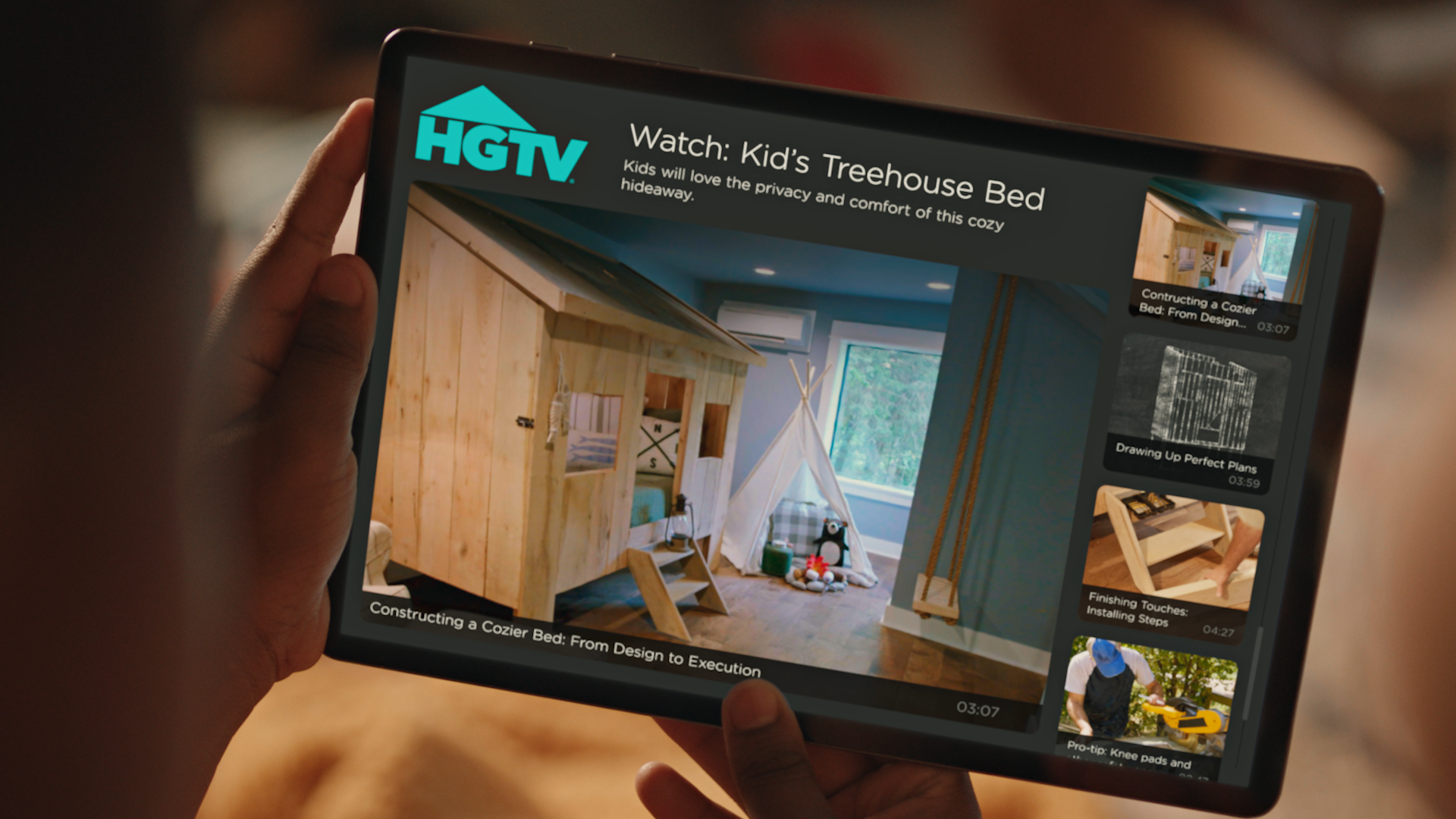 The Discovery+ app on a tablet. A subscriber enjoying HGTV favorites.