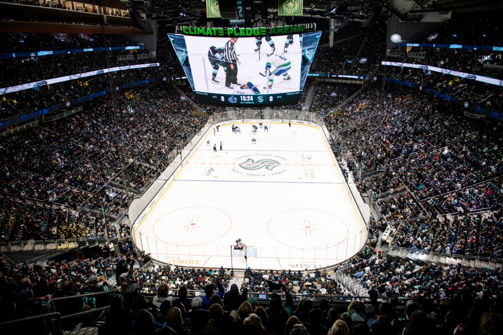 Image of indoor ice hockey rink with full crowd