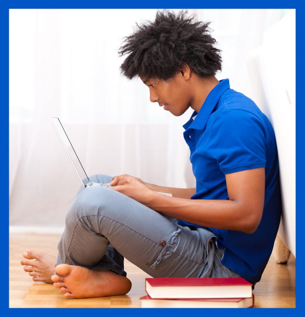 Young man at his laptop