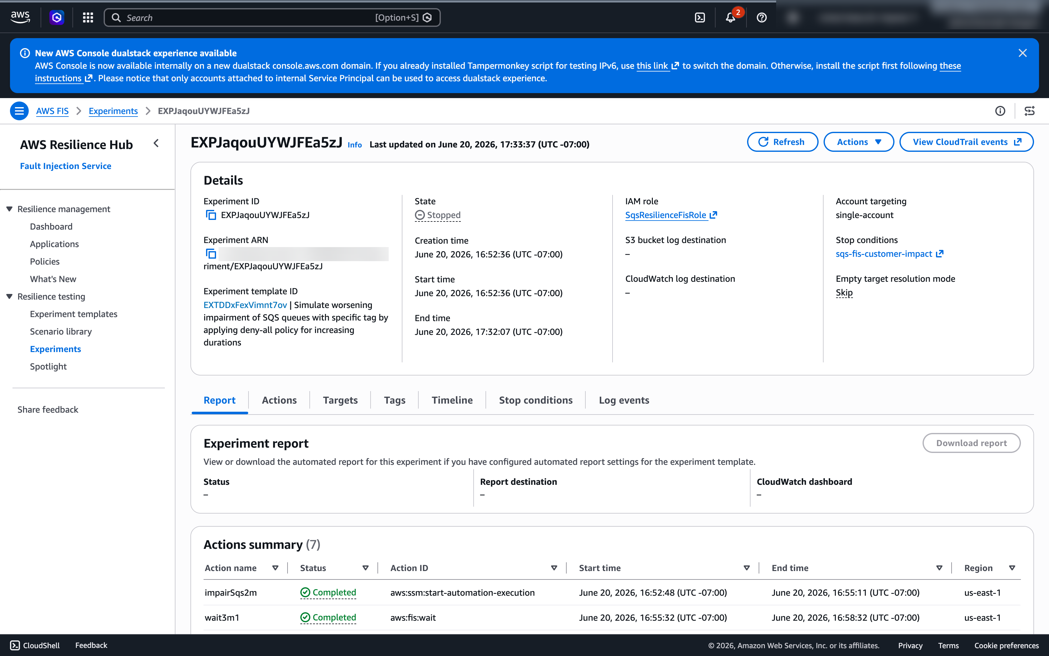 AWS FIS experiment in Stopped state after the customer-impact alarm breached and halted the run